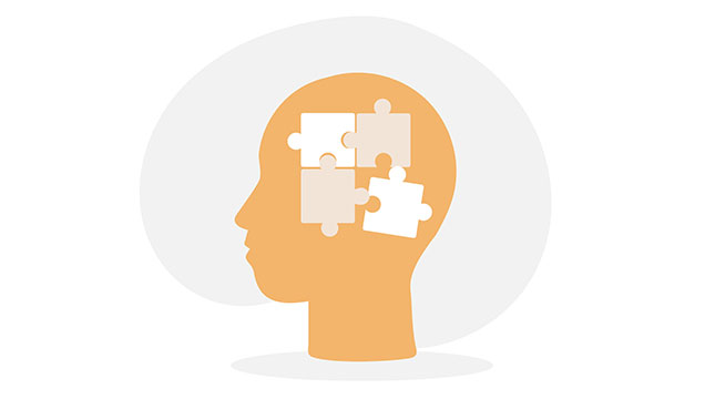 Vector graphic of a person's head with puzzle pieces fitting together