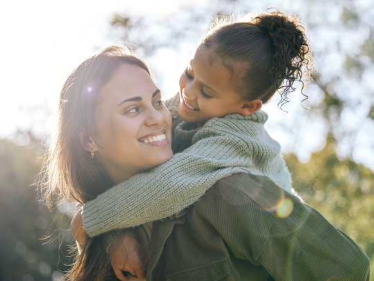 Woman and child outdoors
